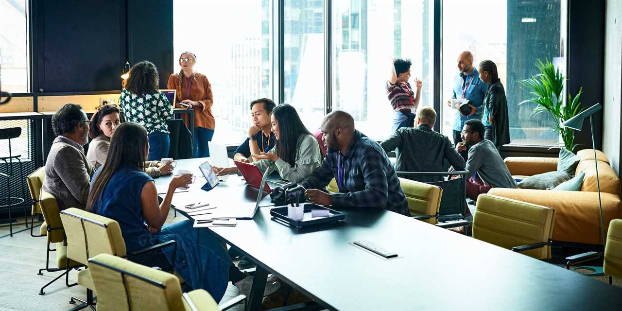 Coworkers working together in office business meeting