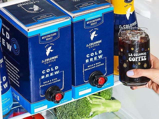 Packages of La Colombe cold brew on tap sit in a fridge as part of the best coffee subscriptions in 2021