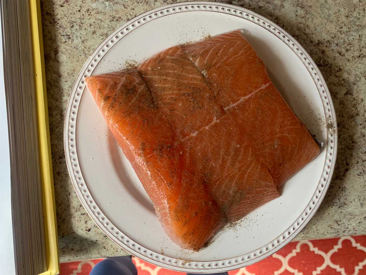 Seasoned salmon on plate