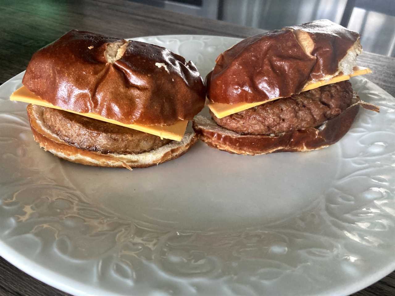 Image of two meatless burgers on a white plate