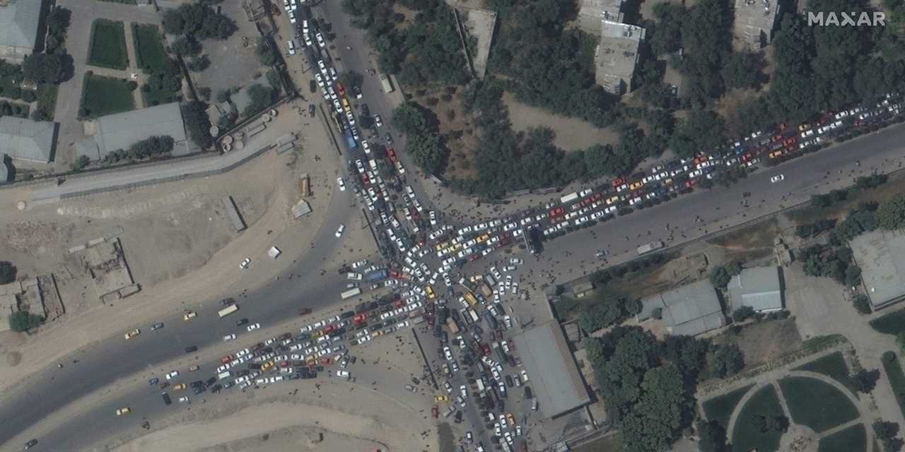Satellite image shows car pileups people near the entrance to Kabul' airport