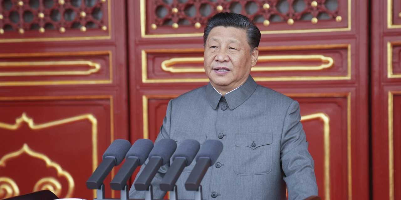 Chinese leader Xi Jinping delivering a speech in Tiananmen Square.