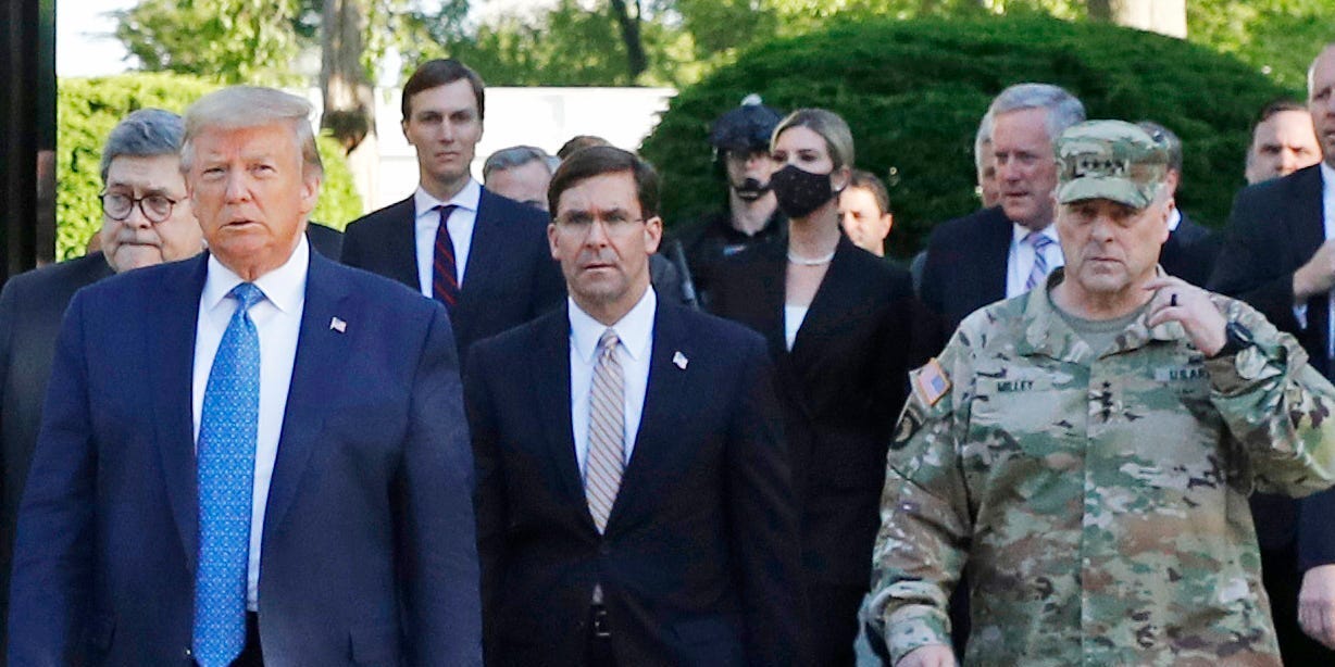 Then-President Donald Trump departs the White House on his way to a photo op outside St. John's Church amid George Floyd protests, accompanied by Chairman of the Joint Chiefs of Staff Mark Milley and other administration officials on June 1, 2020.