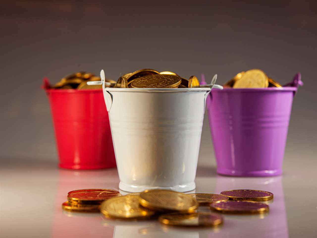 Three buckets of gold coins