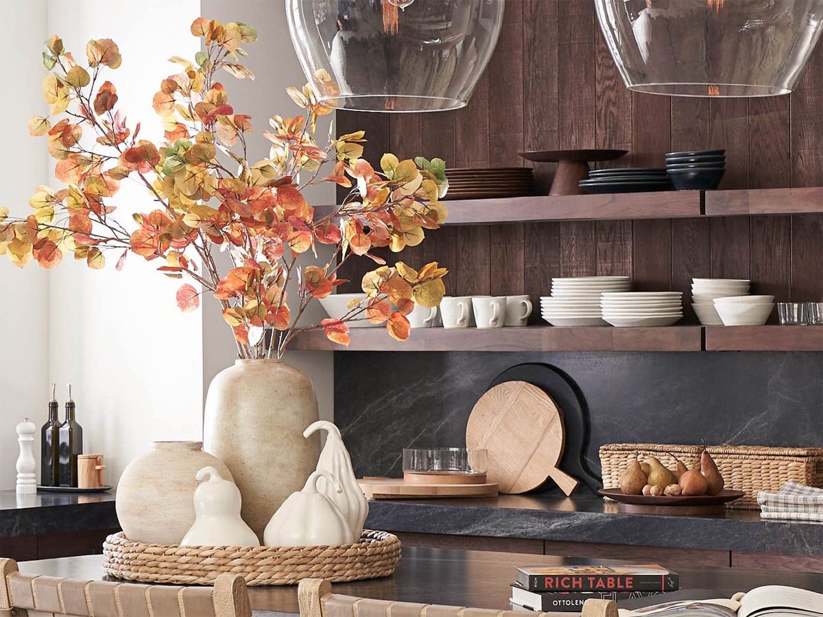 Image of a dining room table with fall decor from Pottery Barn best fall decor 2021