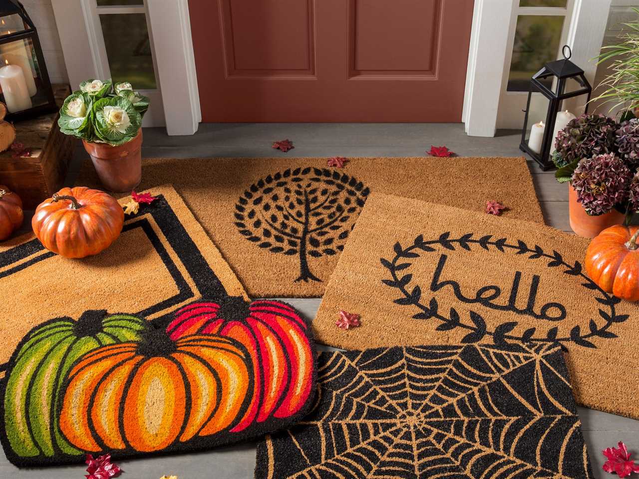 Image of many doormats from Wayfair on a porch best fall decor 2021