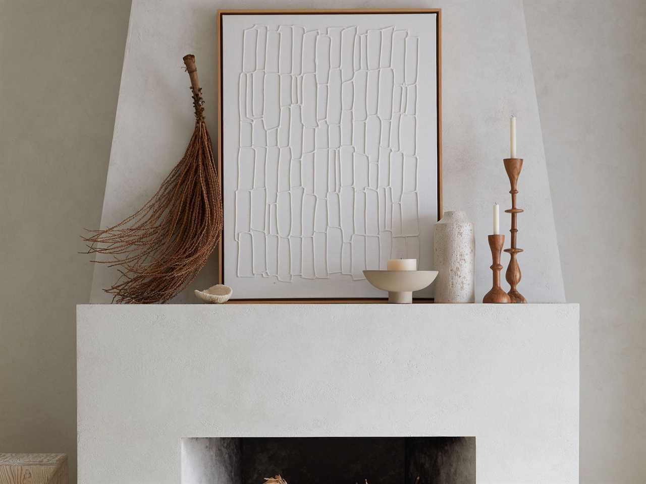 Image of a fireplace with fall decor from Crate and Barrel best fall decor 2021
