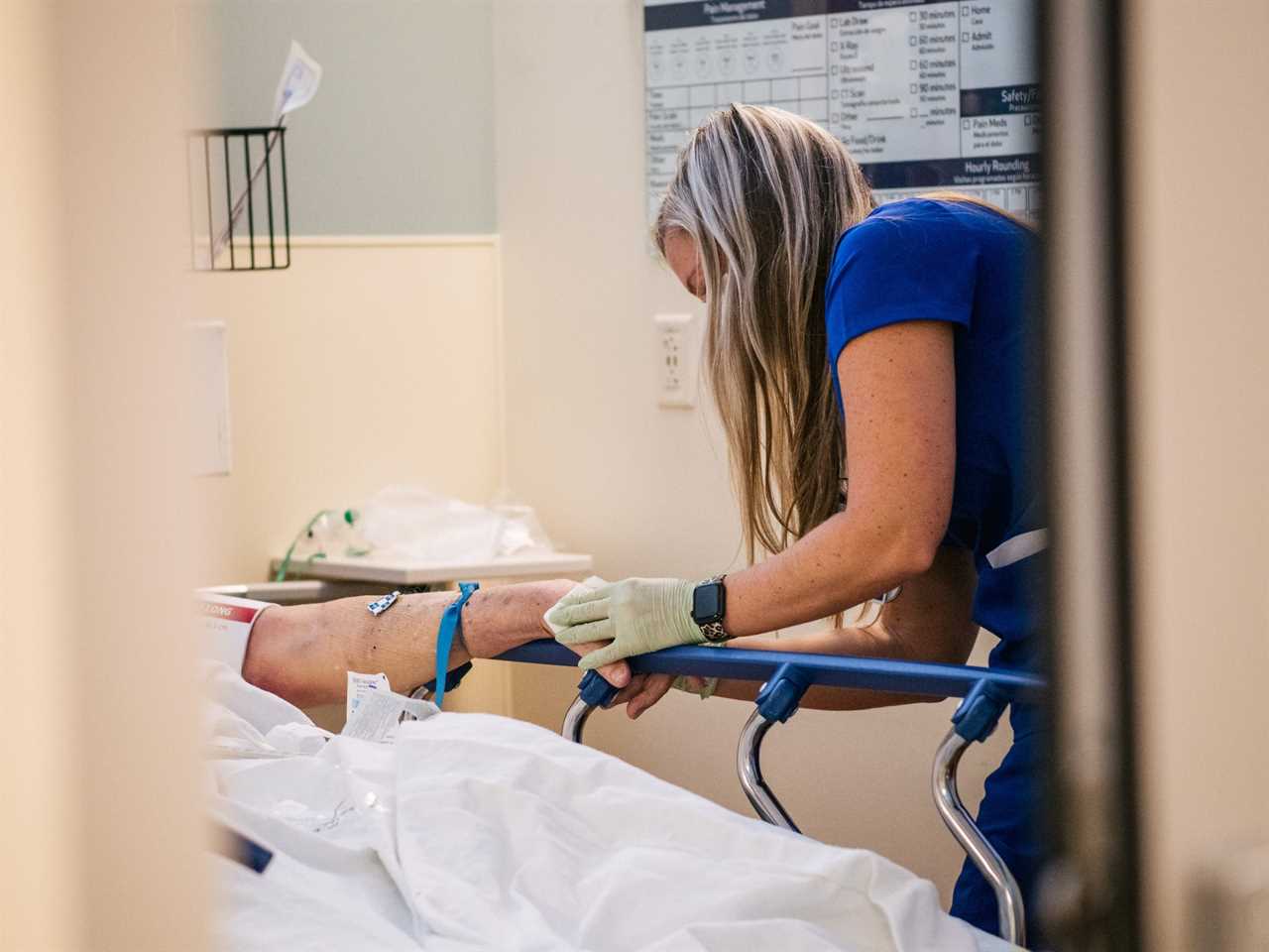 An Emergency Room nurse tends to a patient at the Houston Methodist The Woodlands Hospital on August 18, 2021 in Houston, Texas