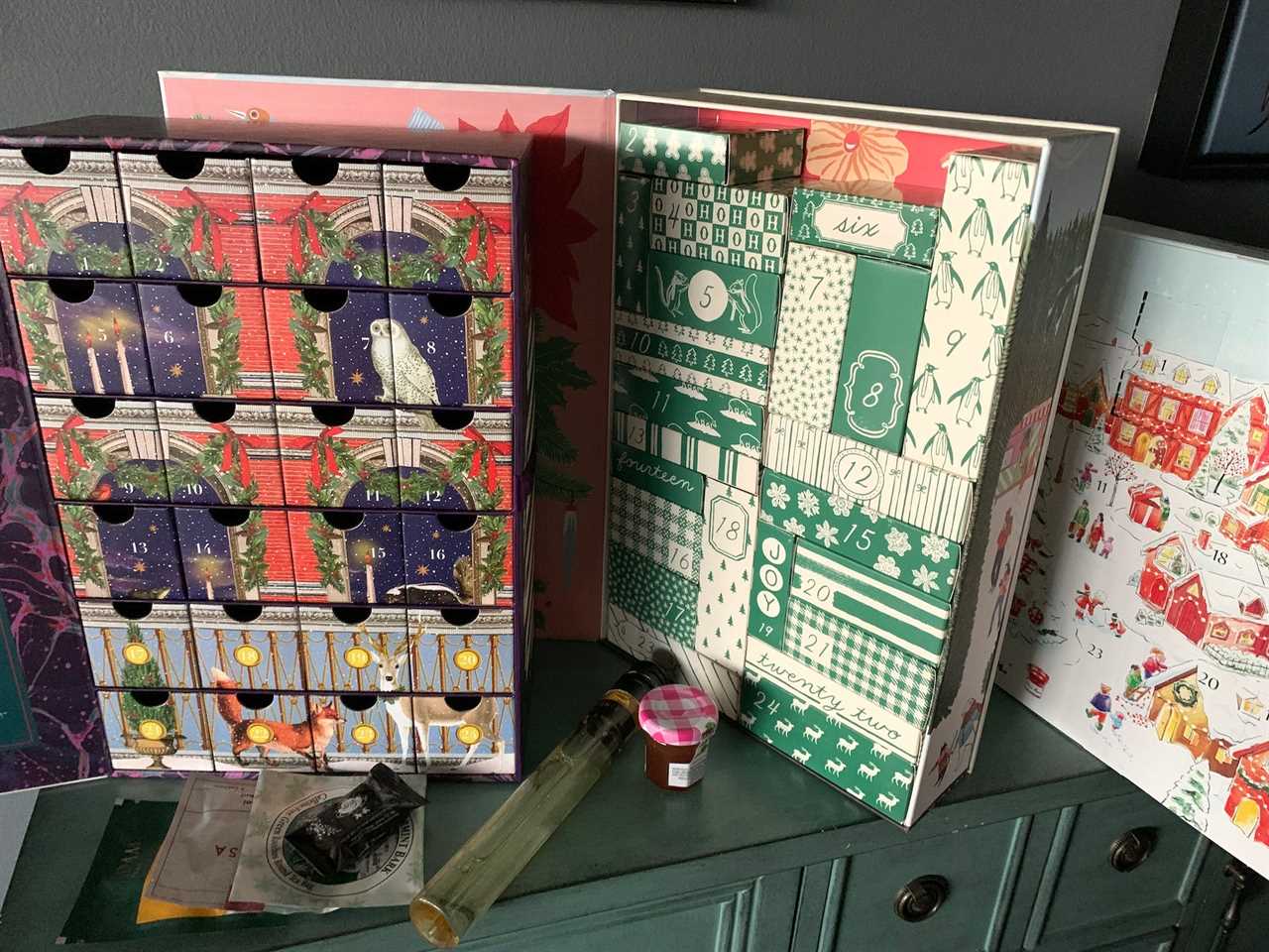 image of several advent calendars on a side table for best advent calendars of 2021