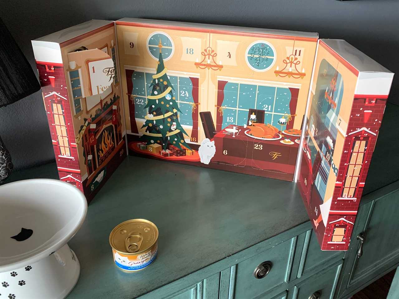 Image of Fancy Feast Advent Calendar on table with can of cat food in front for best advent calendars 2021