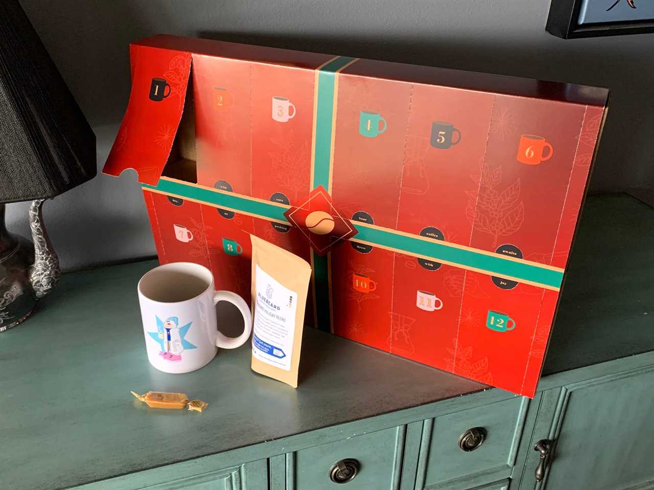 Image of Bean Box Coffee advent calendar with mug and bag of coffee in front for best advent calendars 2021