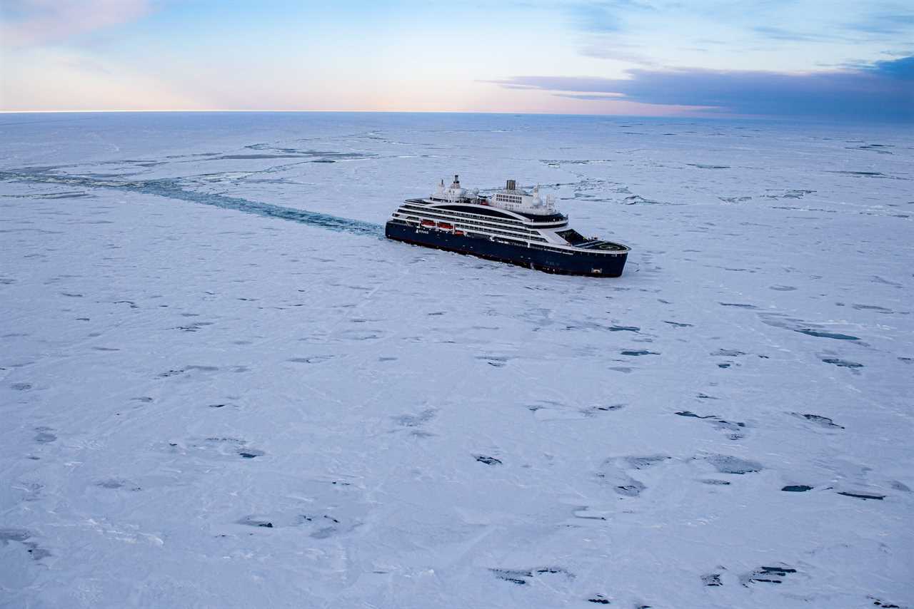 Le Commandant Charcot sailing through icy water