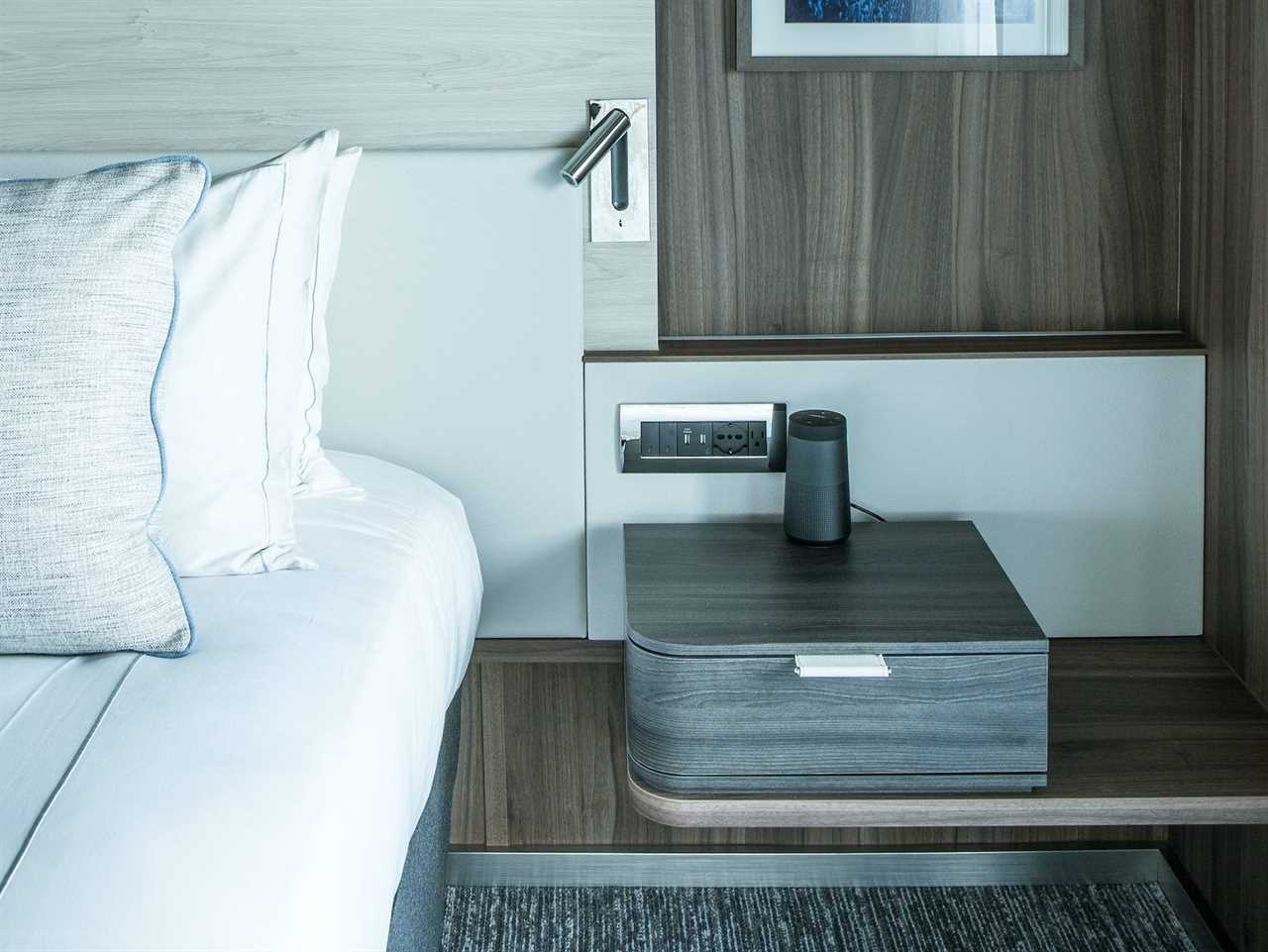 a bed and bedside table