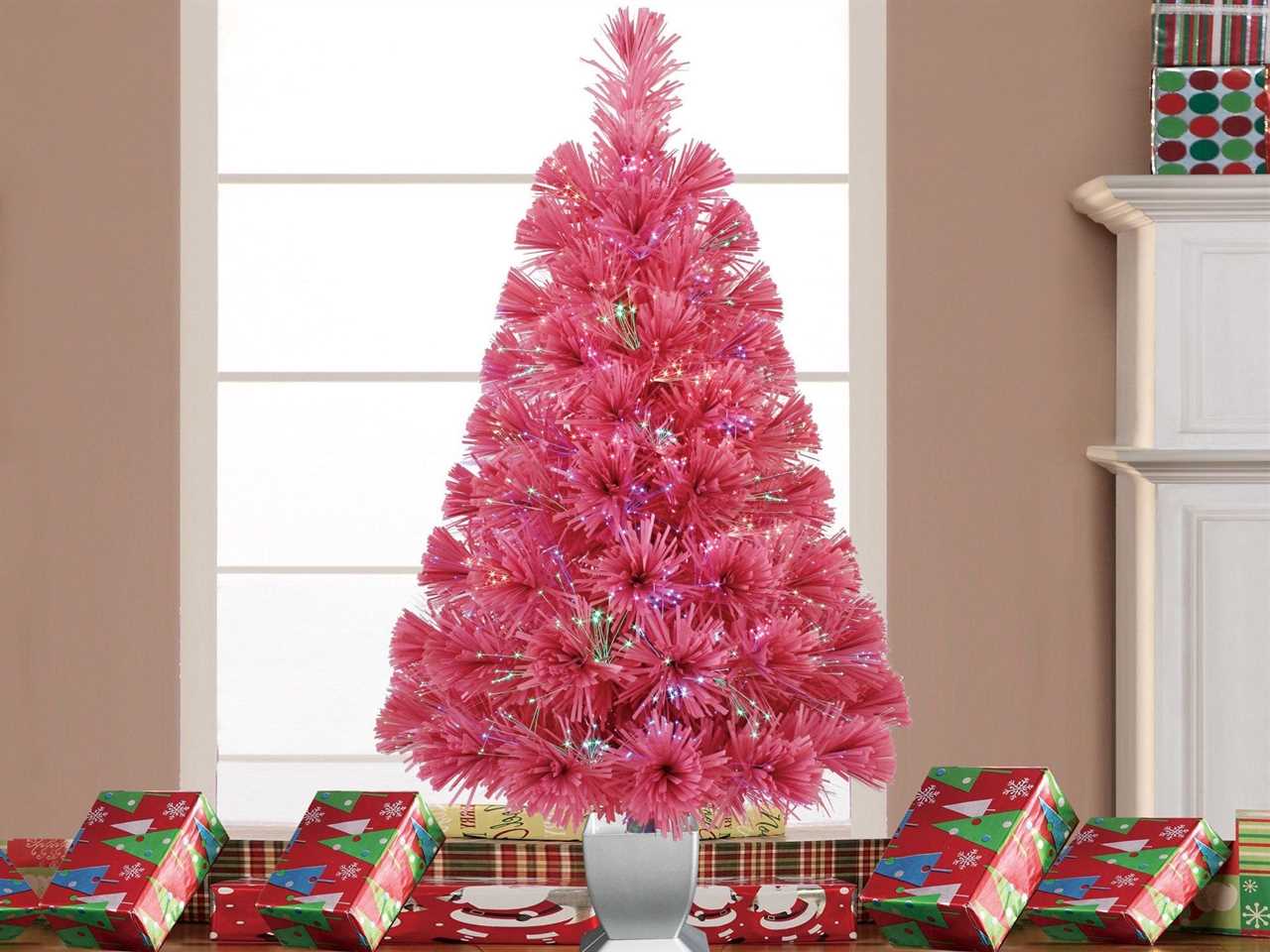 image of Holiday Time Fiber Optic christmas tree with gifts under it best tabletop christmas tree 2021