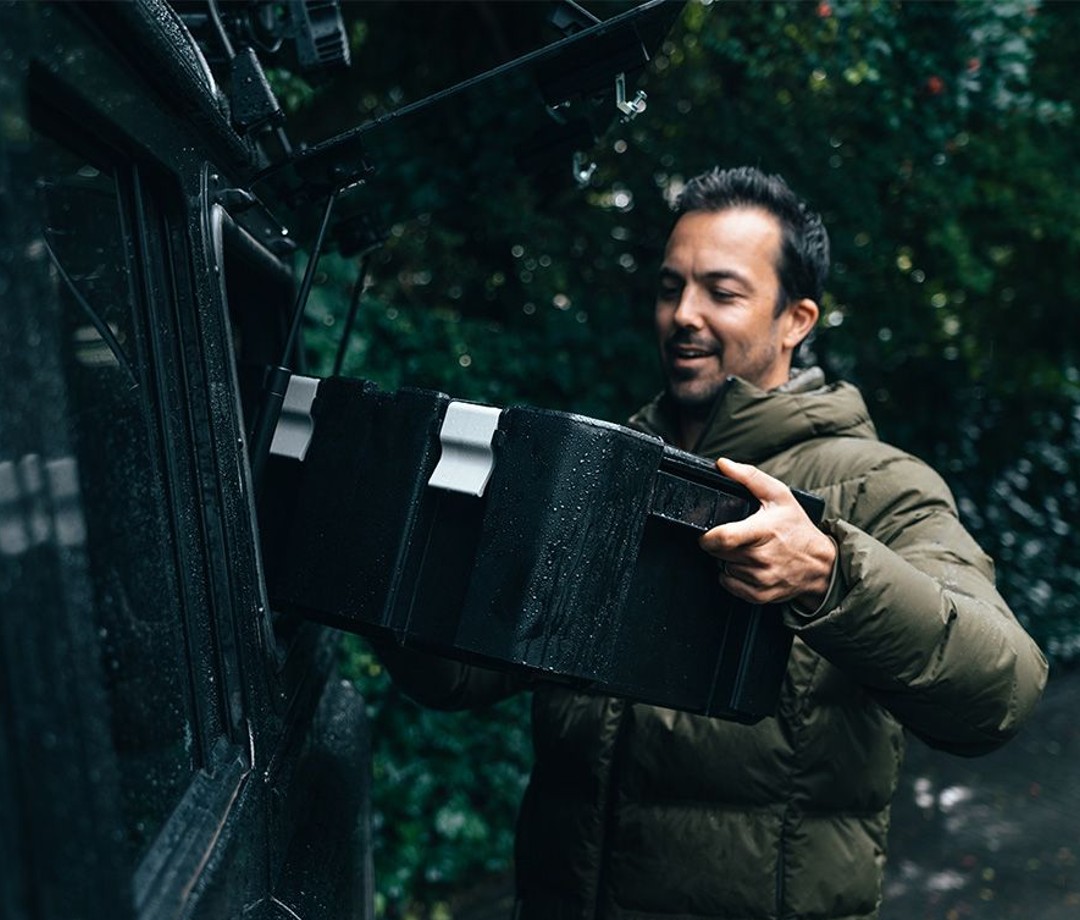 Man taking out storage box