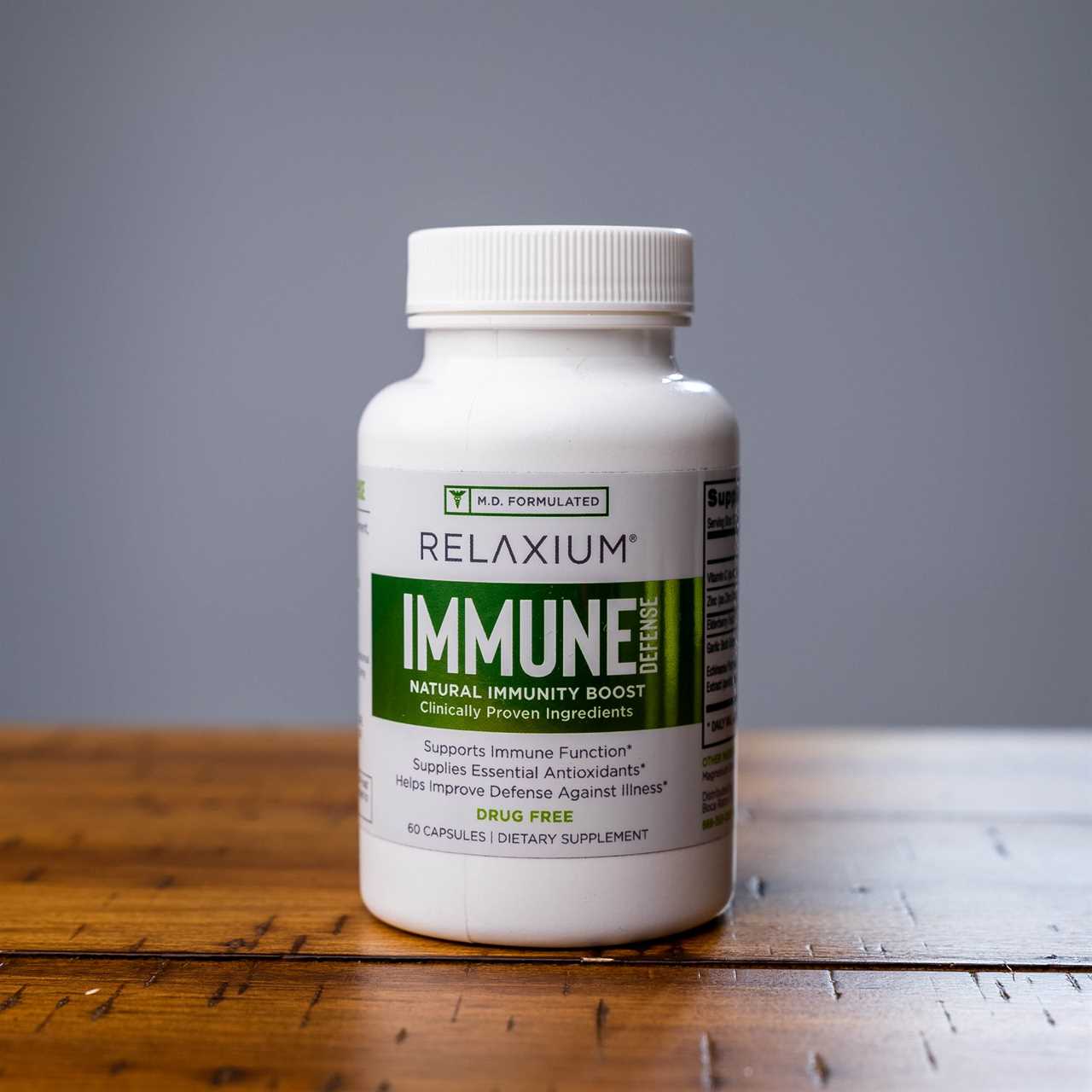 RELAXIUM® Immune Defense supplement bottle with green label