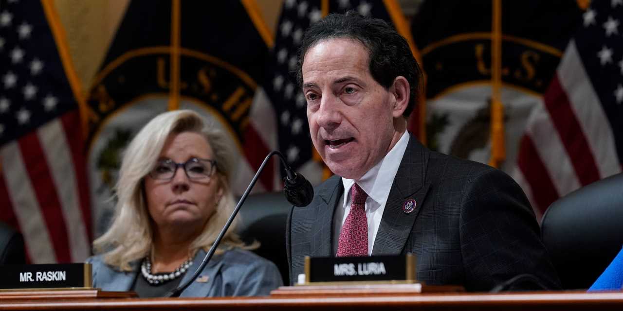 Vice Chair Liz Cheney, R-Wyo., listens at left as Rep. Jamie Raskin, D-Md., speaks as the House committee investigating the Jan. 6 attack on the U.S. Capitol pushes ahead with contempt charges against former Trump advisers Peter Navarro and Dan Scavino