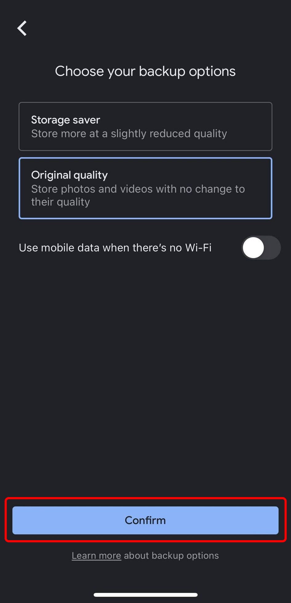 The Google Photos app on iPhone, with the “Confirm” button for backing up photos highlighted.