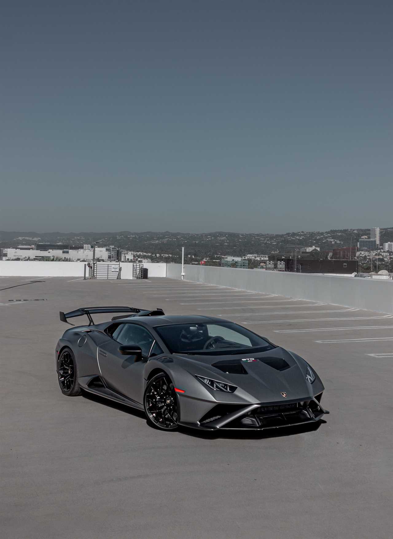 A gray Lamborghini Huracan STO.