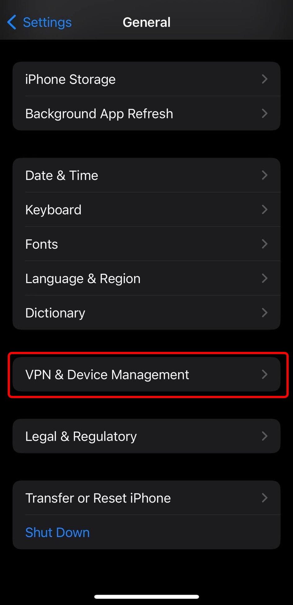 The General settings on an iPhone, with the “VPN & Device Management” option highlighted.