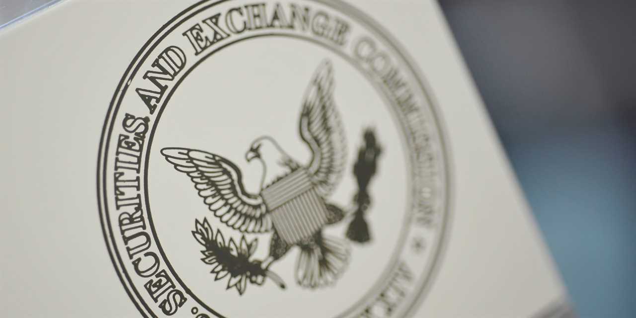 FILE PHOTO: The U.S. Securities and Exchange Commission logo adorns an office door at the SEC headquarters in Washington, June 24, 2011. REUTERS/Jonathan Ernst