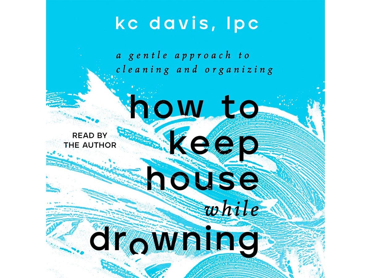 “How to Keep House While Drowning” by KC Davis audiobook cover, featuring an illustration of a raging sea.