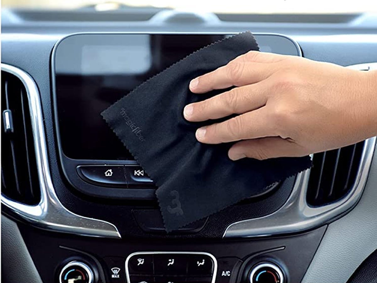 a hand wipes off a car screen with a MagicFiber Microfiber Cloths as one of the best tech products under $50