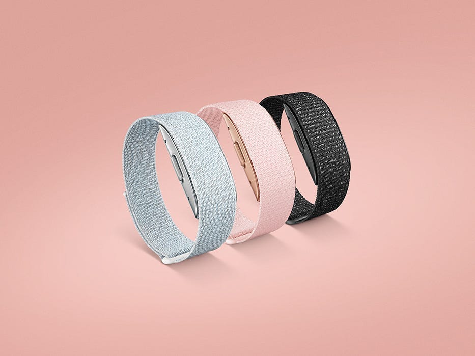 amazon halo band hero colors in onyx, pink, and black in front of a pink background