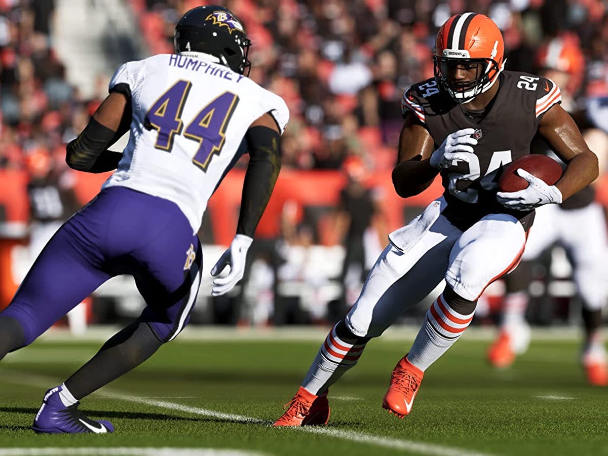 screenshot from the Madden 23 with a player with the ball and an opposing player moving in to tackle