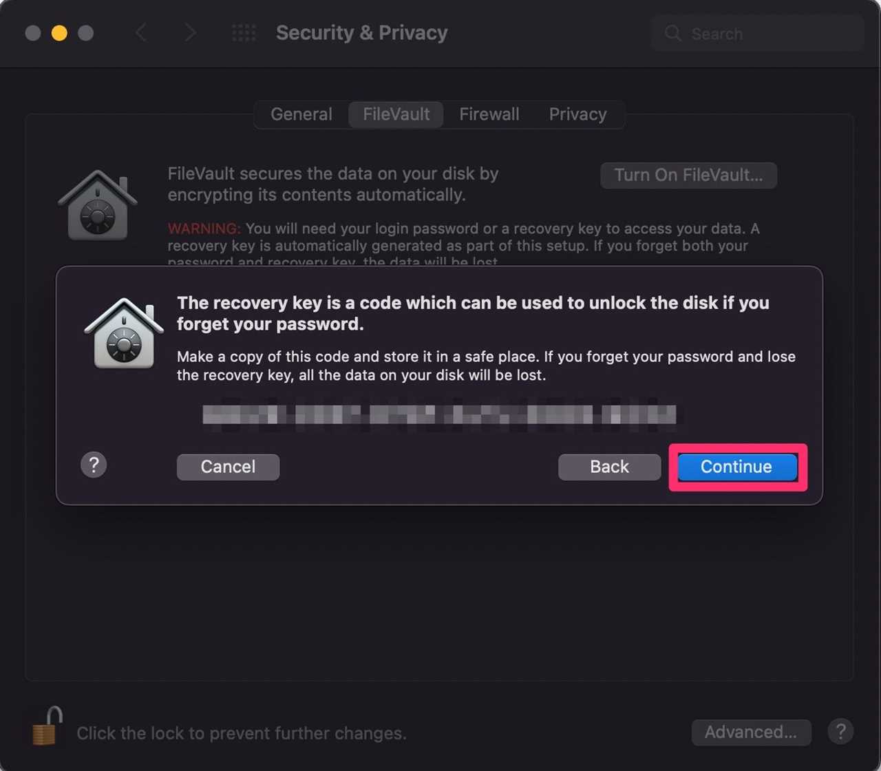 A pop-up on Mac with the FileVault recovery code. The "Continue" button has been highlighted.
