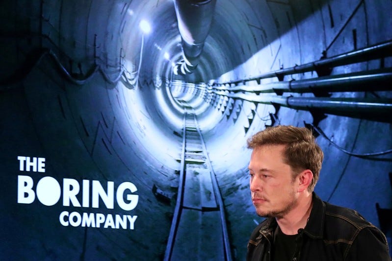 FILE PHOTO - Elon Musk arrives to speak at Boring Company community meeting in Bel Air, Los Angeles, California, U.S. May 17, 2018. REUTERS/Lucy Nicholson/File Photo