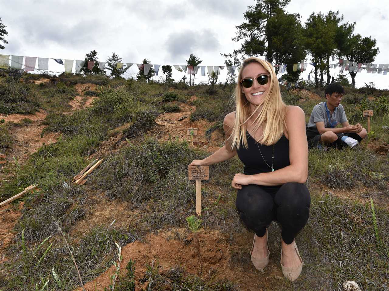 Cassie De Pecol tree planting in Bhutan.