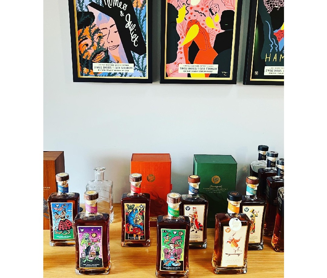 Colorfully labeled bottles of whiskey in the tasting room at Rabbit Hole distillery.