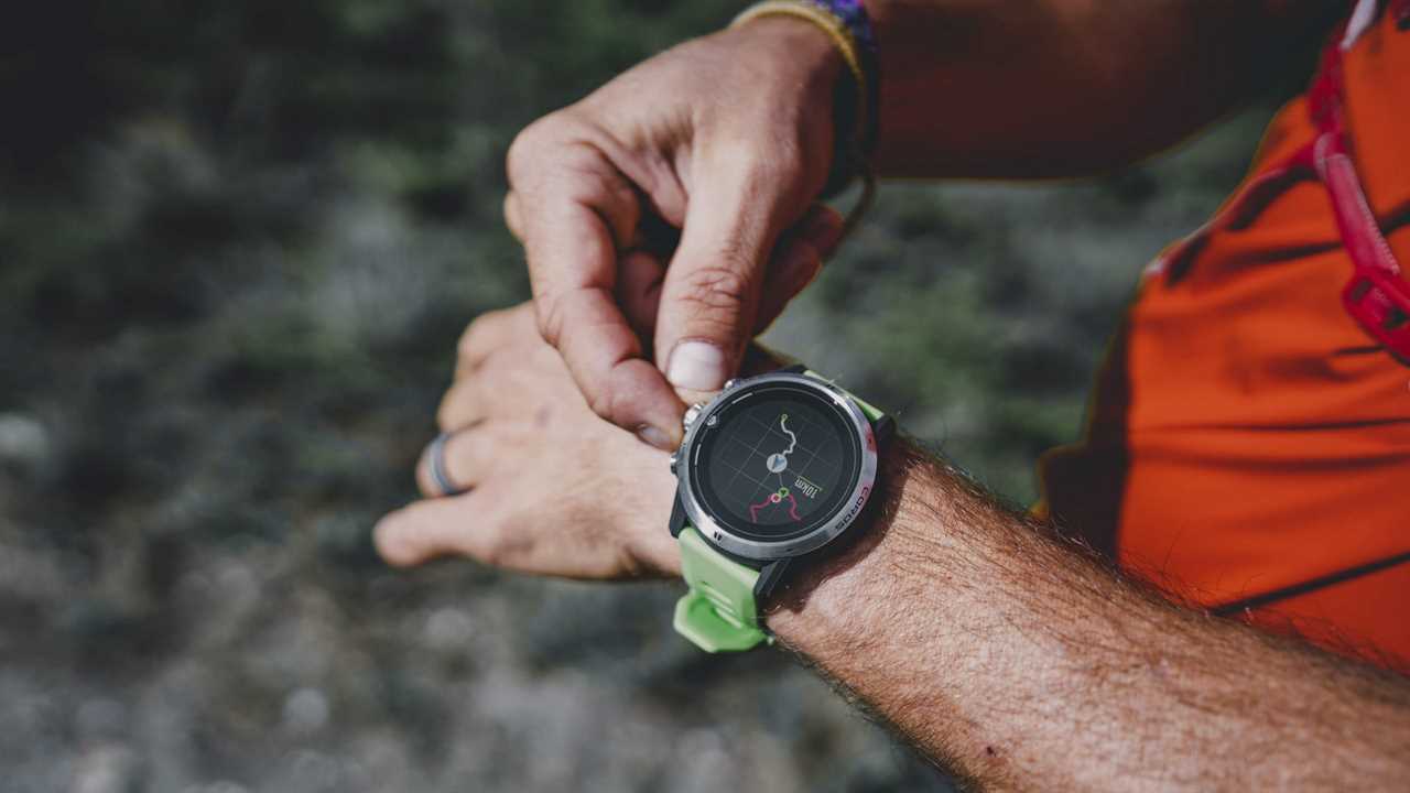 man using a gps watch gps watches