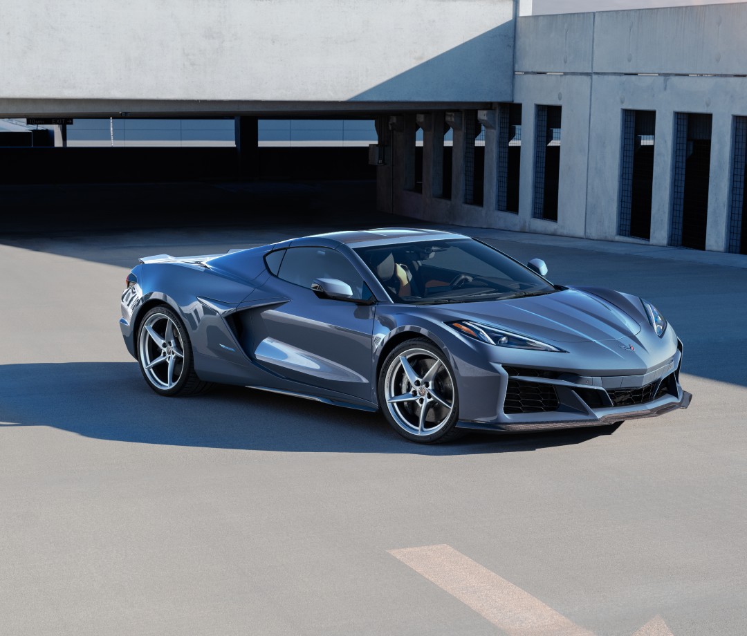 Silver sports car parked in lot