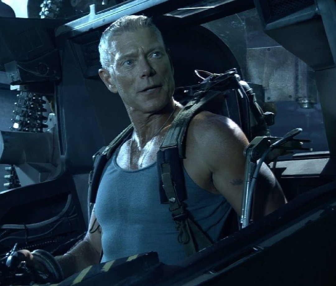 Actor Stephen Lang seated in a mech as Col. Quaritch in Avatar: The Way of Water.