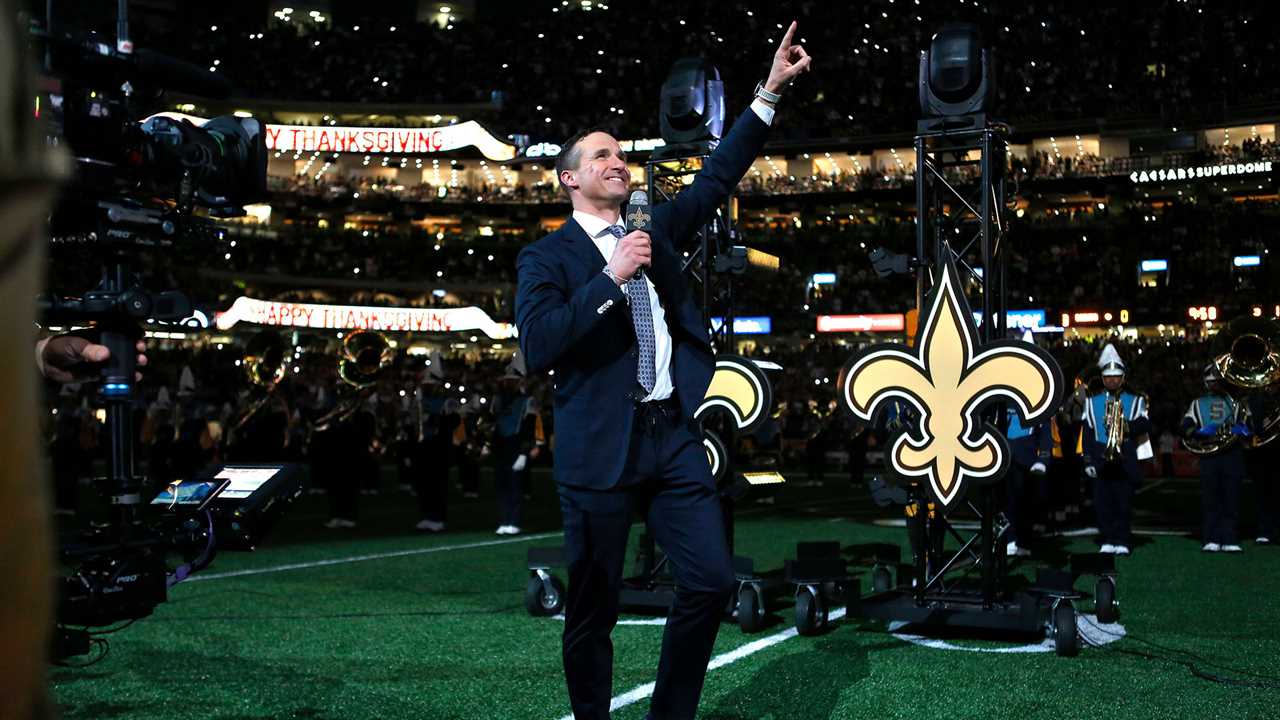 Former New Orleans Saints quarterback and NBC Sports commentator Drew Brees at stadium wearing suit