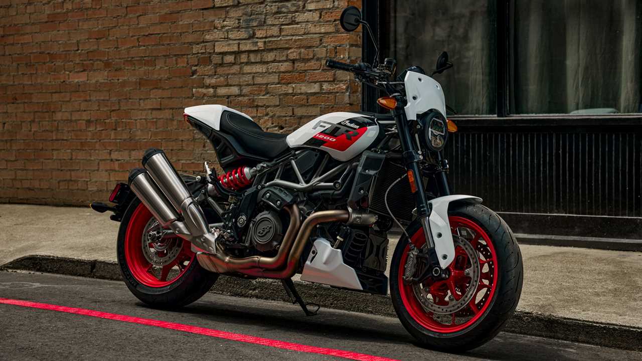 2023 Indian Motorcycle FTR Sport parked on a street by a curb. new motorcycles 2023