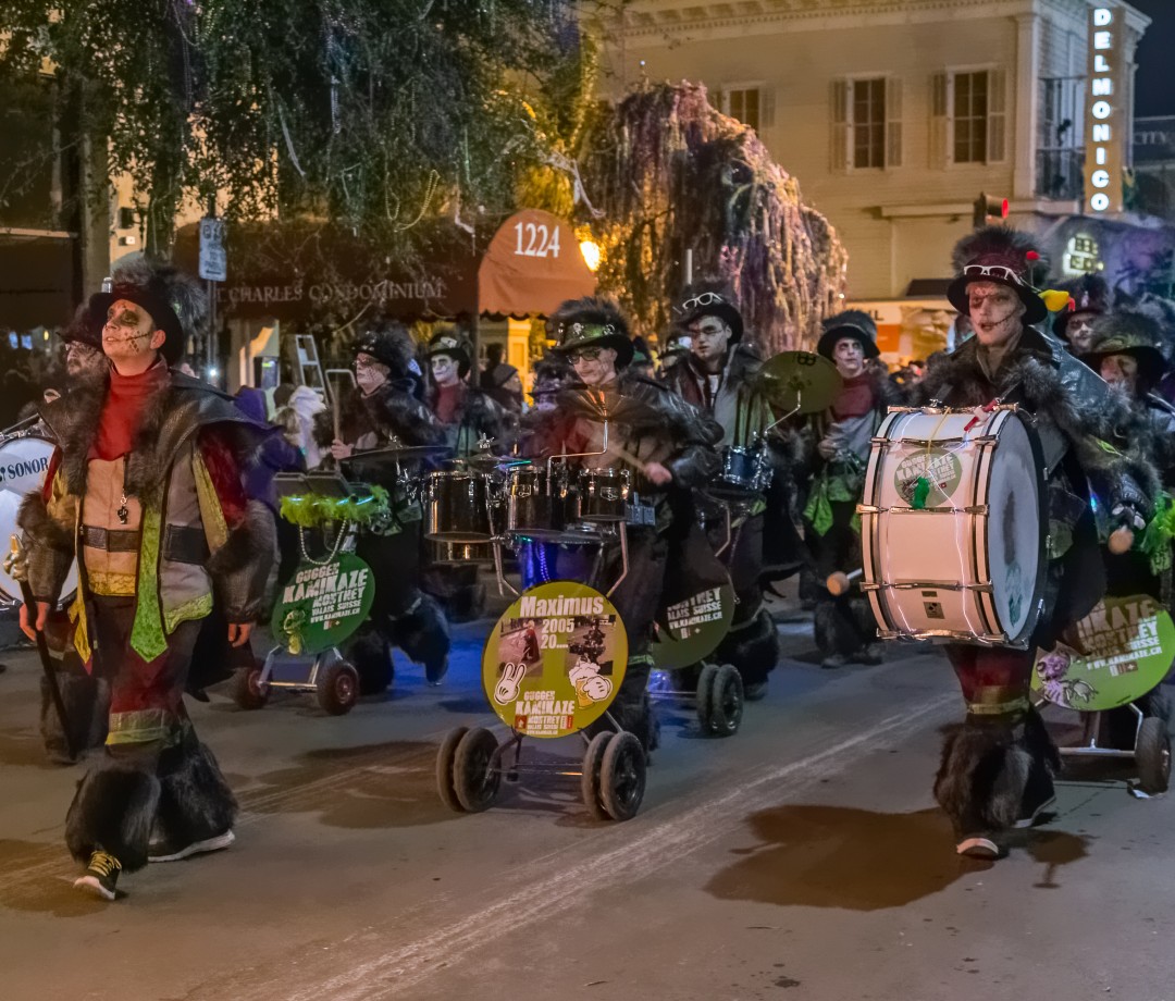 A krewe marches in a Mardi Gras parade