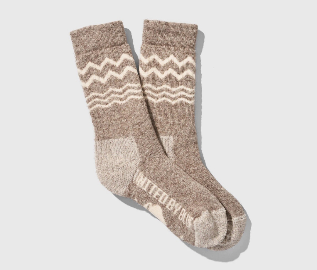 Brown United by Blue Ultimate Bison Socks on a grey background. wool socks.