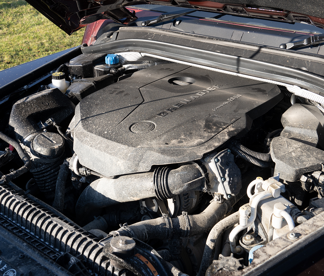 Muddied engine in a 4x4 SUV.