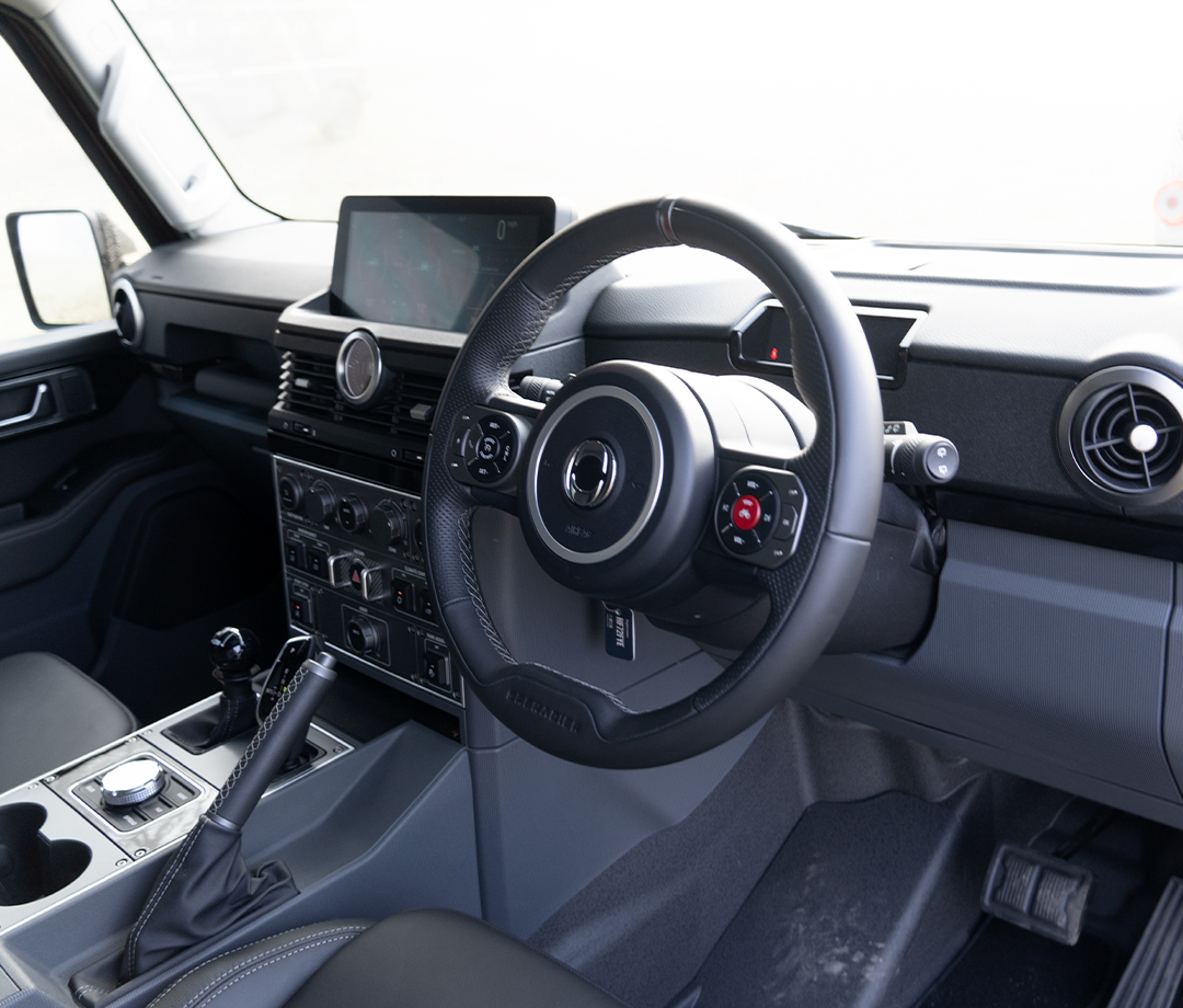Spartan grey interior of a 4x4 SUV.