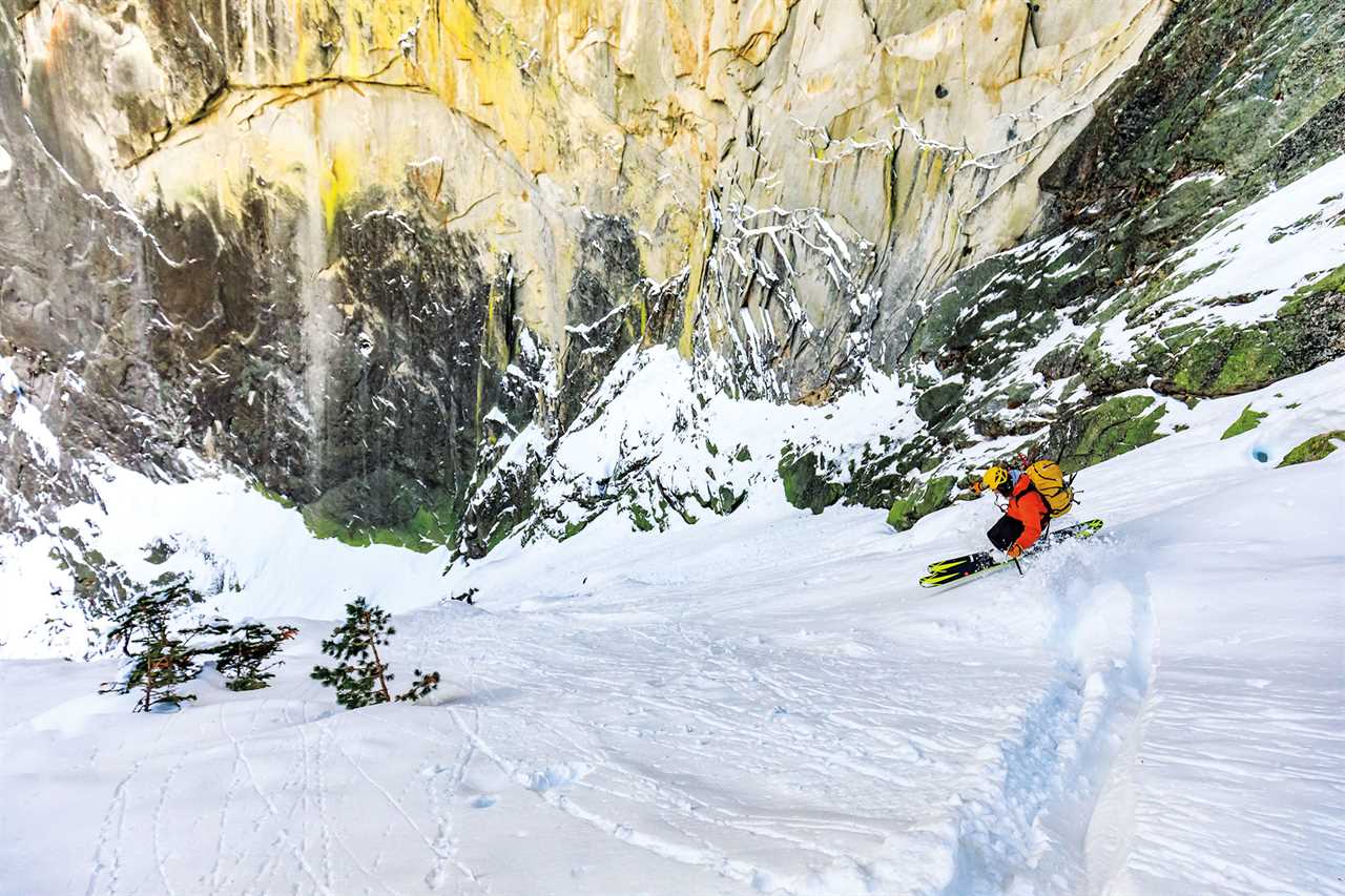 Skiing down steep line at Half Dome in Yosemite.