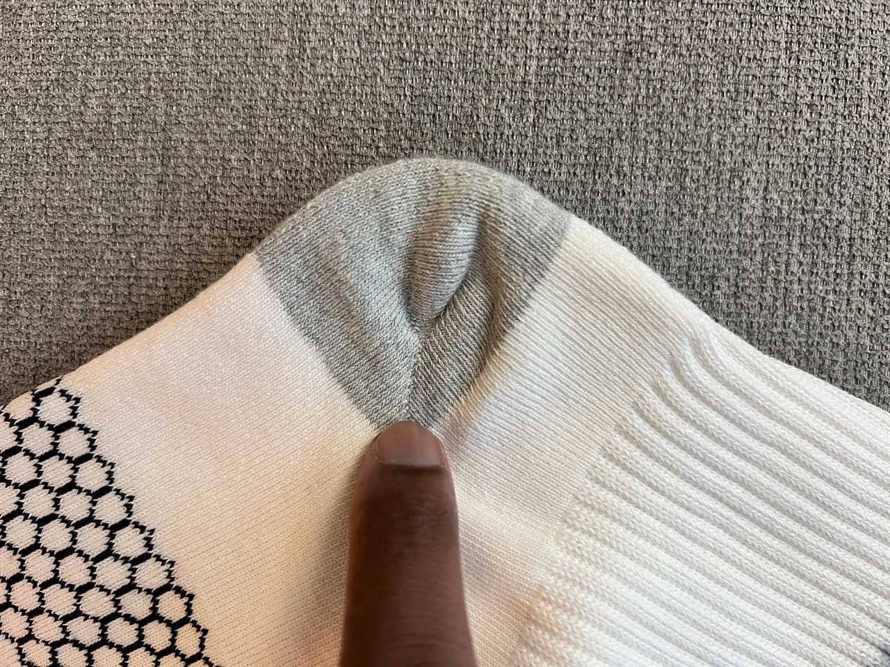 A close-up of the Y-Stitch Heel on Bombas socks.