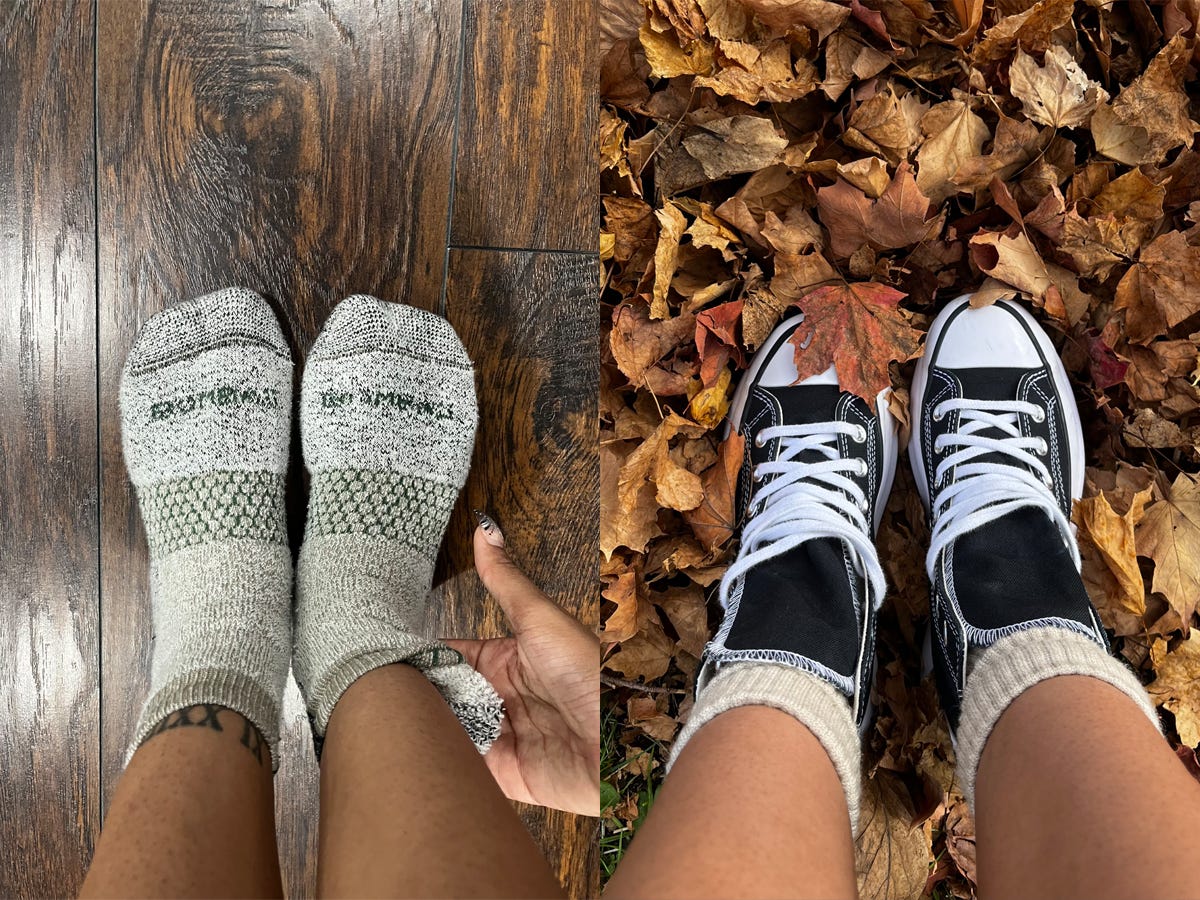 Side-by-side collage. On the left, an author's feet shown wearing the Bombas Women's Merino Wool Gripper House Socks while standing on a wooden floor. On the right, the tops of the Bombas Women's Merino Wool Calf Socks coming out of black Converse sneakers the author is wearing while standing in a pile of leaves.