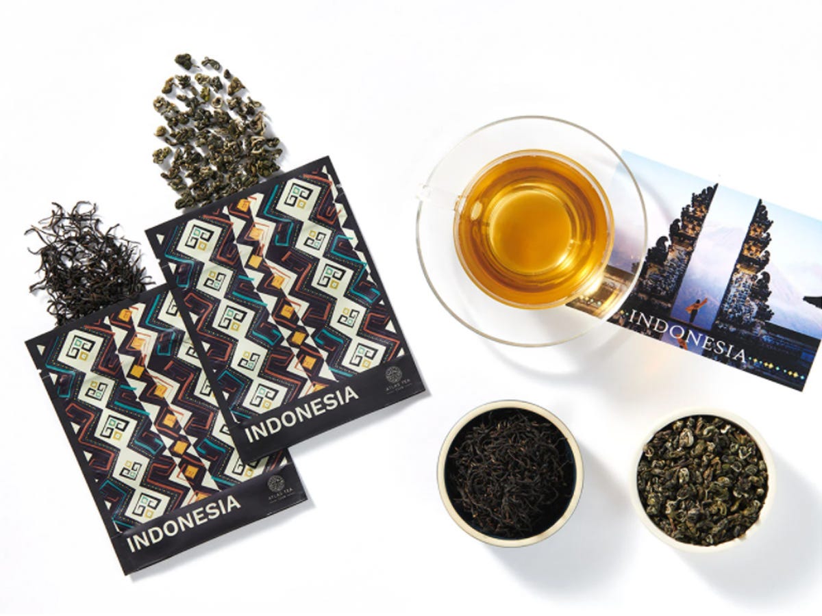 An Atlas Tea Club gift subscription containing two teas, tea cup, and a photo of Indonesia.