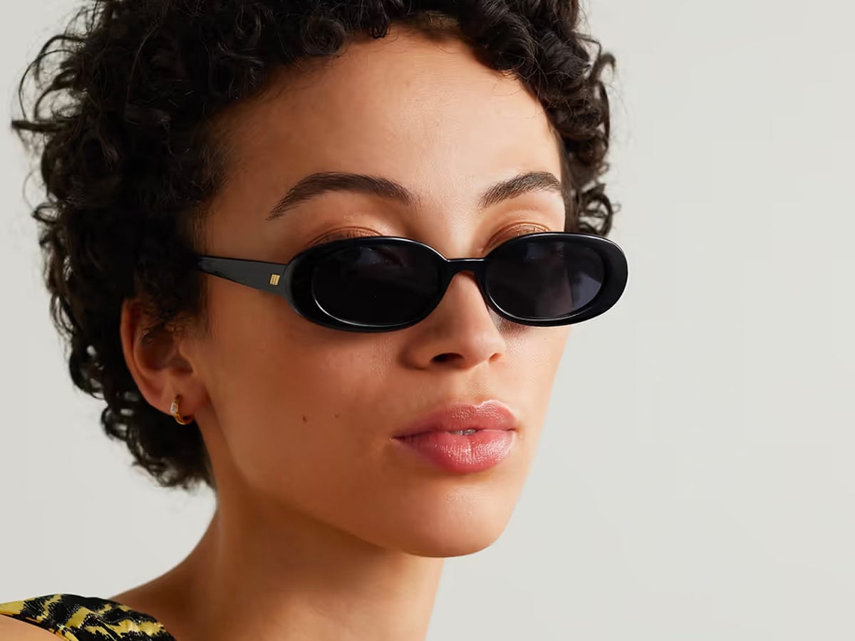 Person wearing a pair of Le Specs Outta Love Sunglasses.