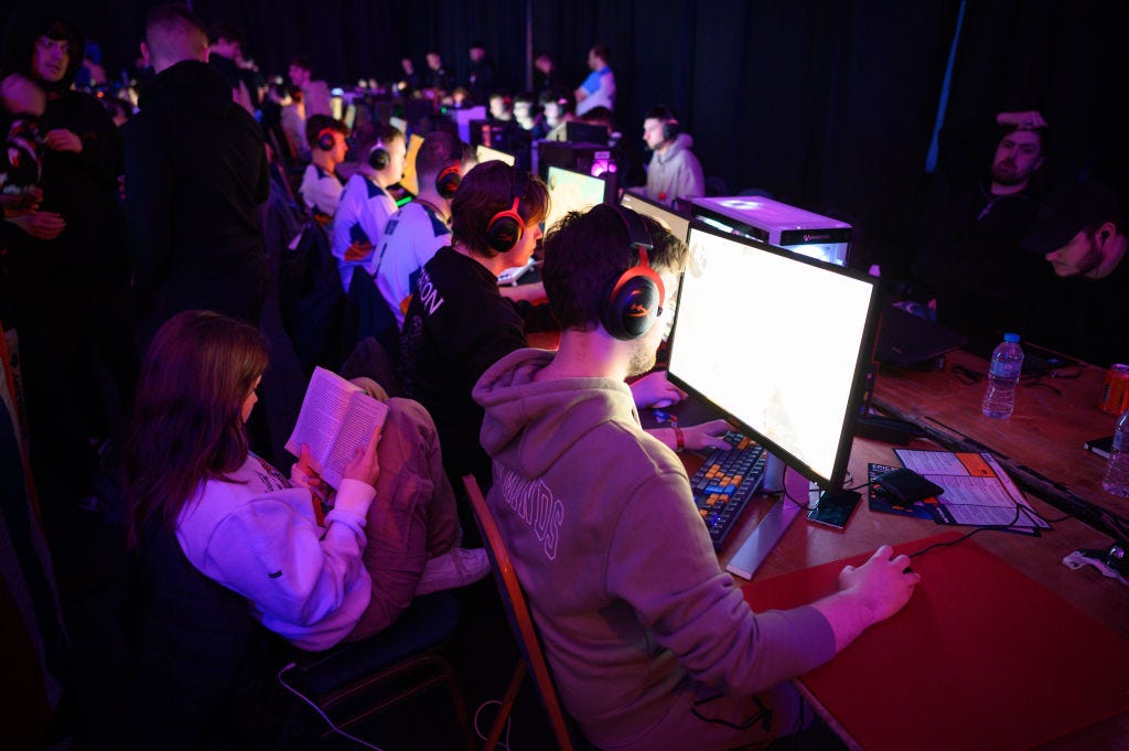 Esport competitors take part in a gaming tournament at the Epic.Lan 38 event in Kettering, England.