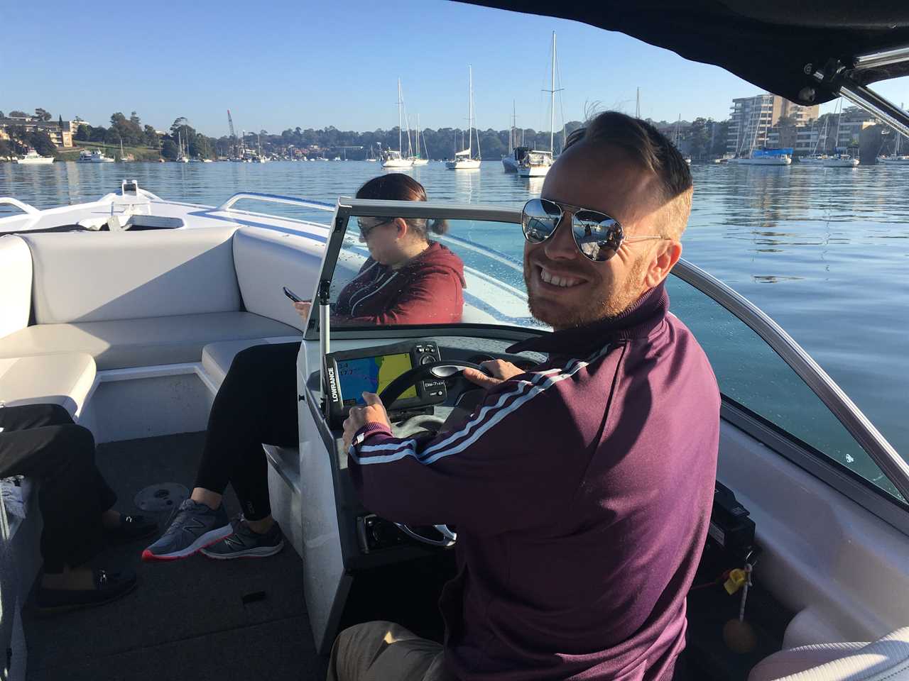 a man driving a boat