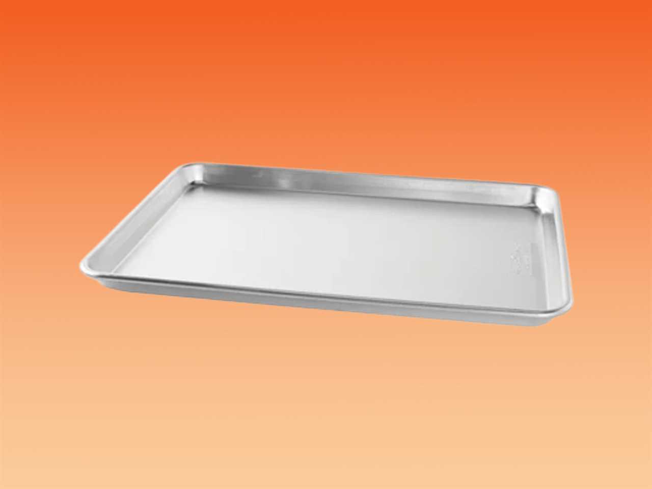 The Nordic Ware Naturals Half Sheet on an orange gradient background.